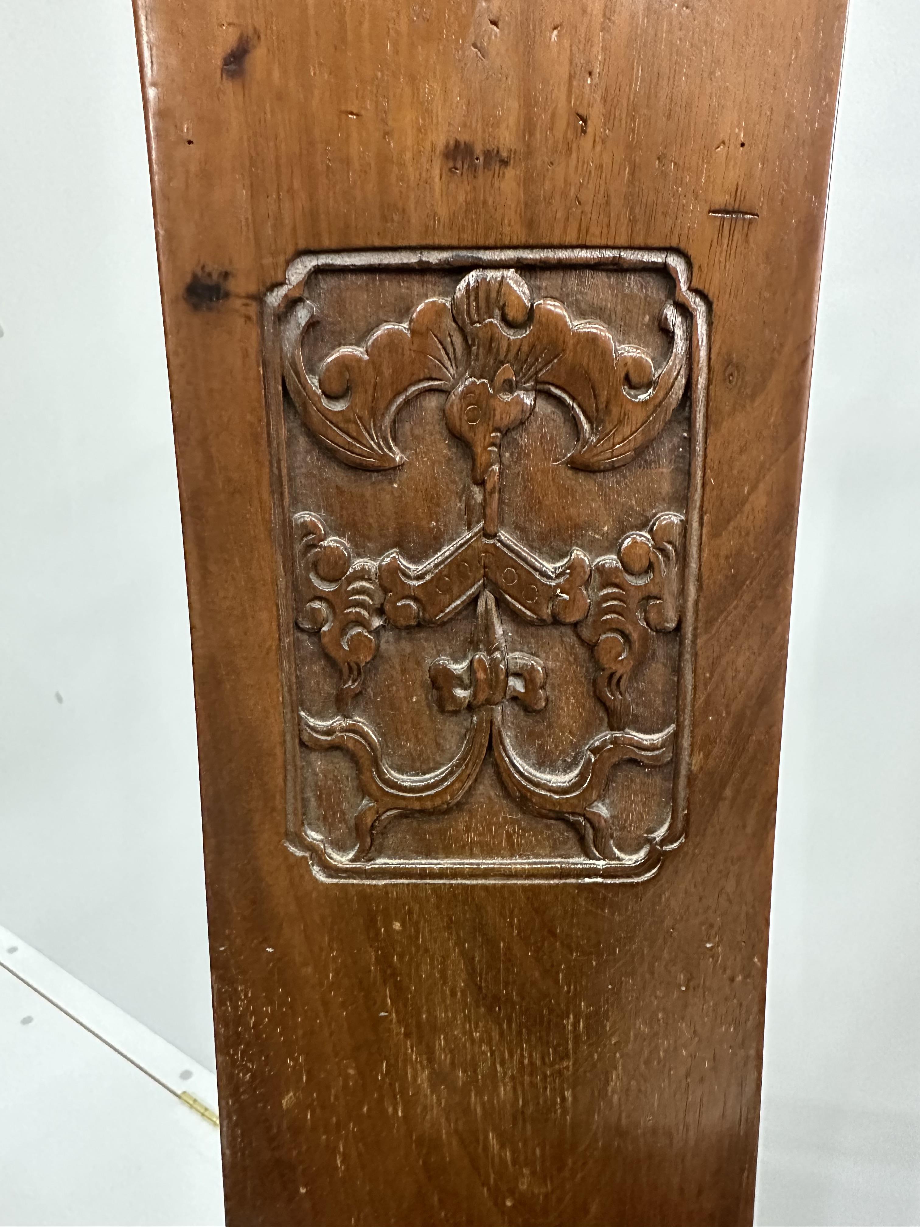 A pair of Chinese hardwood elbow chairs, width 56cm, depth 44cm, height 107cm